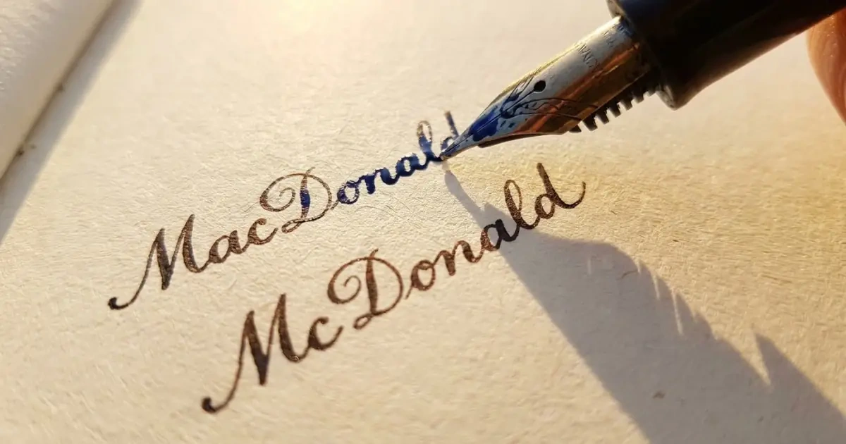 A detailed shot of a fountain pen exploring spelling variations in names with cultural roots.